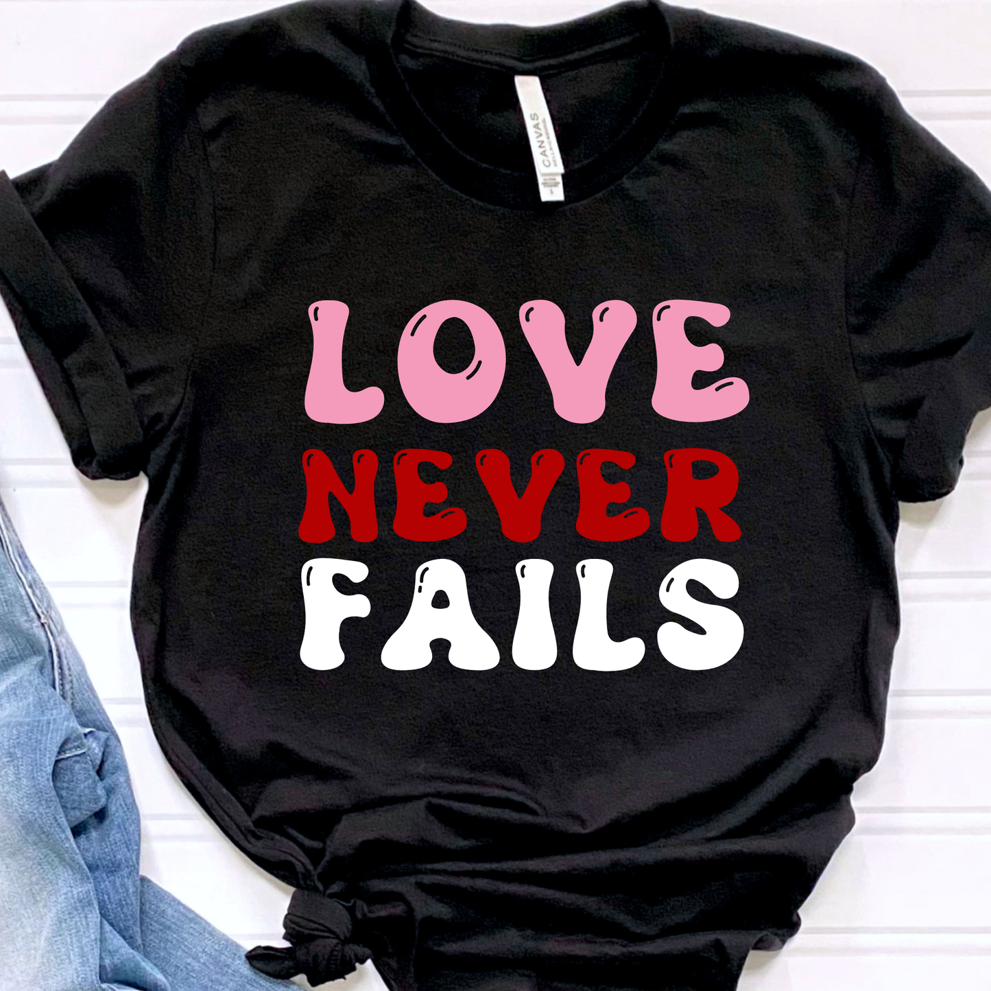 Love Never Fails Tee
